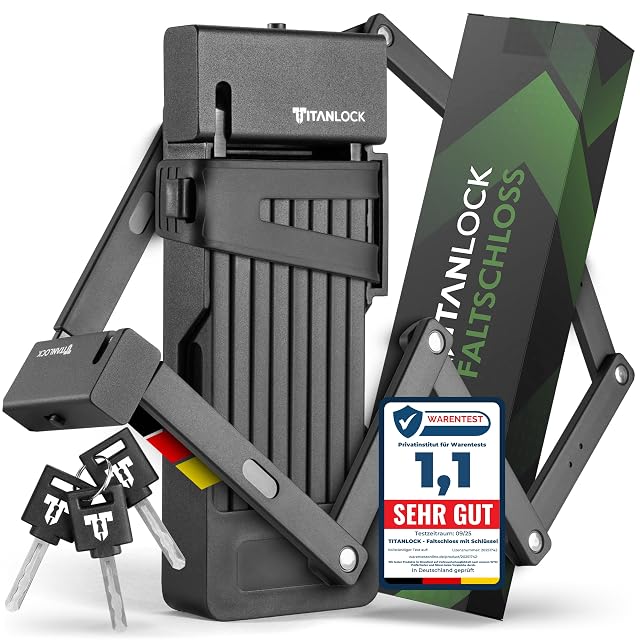 Antivol pliant vélo TITANLOCK déplié sur toute sa longueur, à côté de son support de cadre